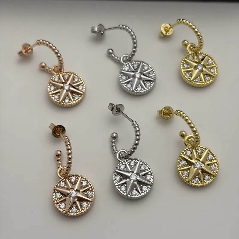 Zircon Compass Star Stud Earrings