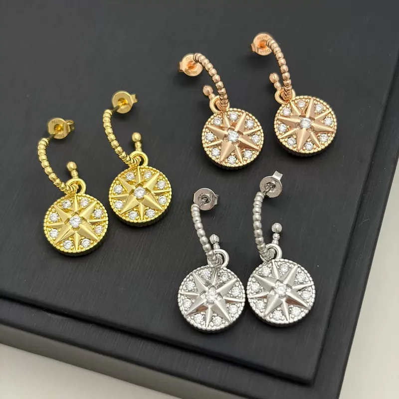 Zircon Compass Star Stud Earrings