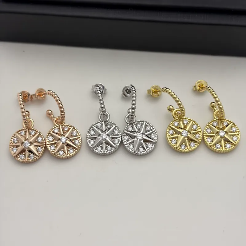Zircon Compass Star Stud Earrings