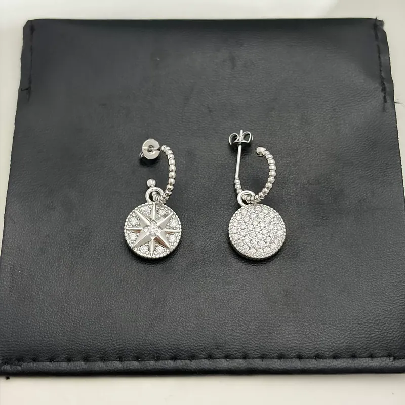 Zircon Compass Star Stud Earrings