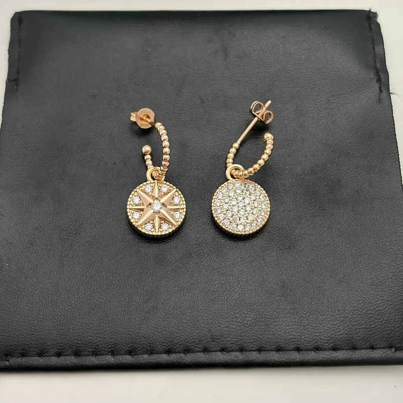Zircon Compass Star Stud Earrings