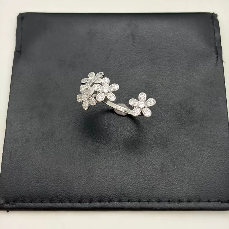 Zircon Clover Ring Open Design
