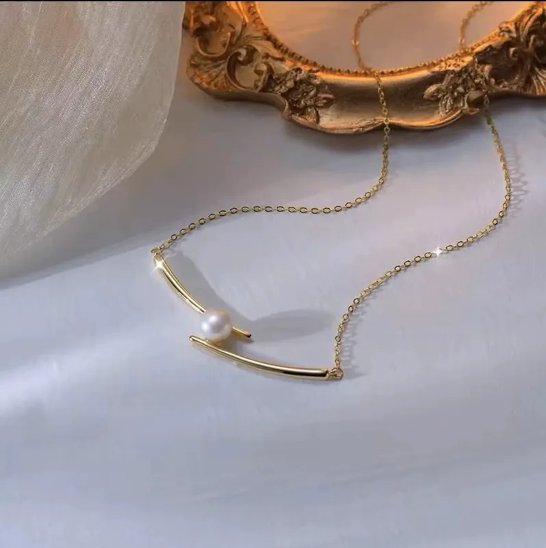 Collar con colgante de perla sonriente