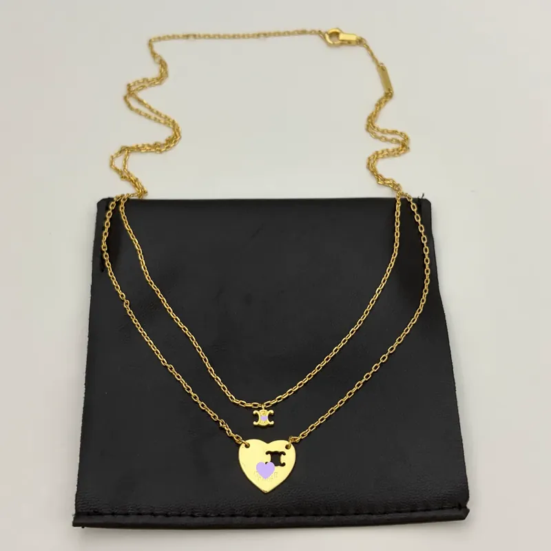 Collar de acero de titanio corazón en capas