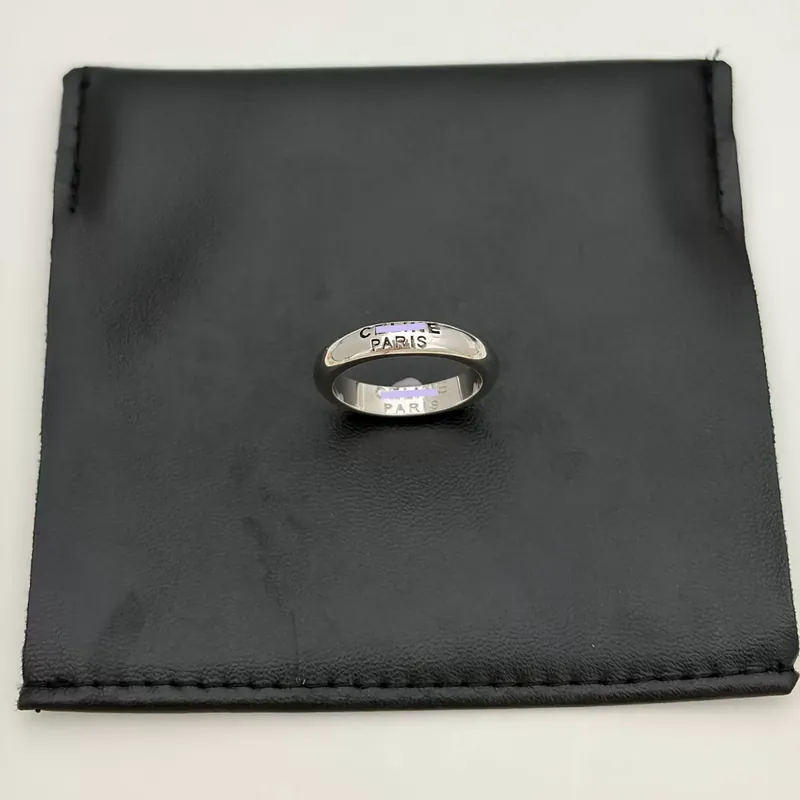 Titanium Steel Arc de Triomphe Vintage Letter Ring Couple Band