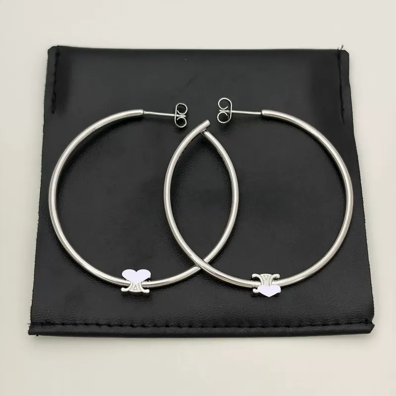Pendientes de aro grandes de acero de titanio Arco de Triunfo minimalistas