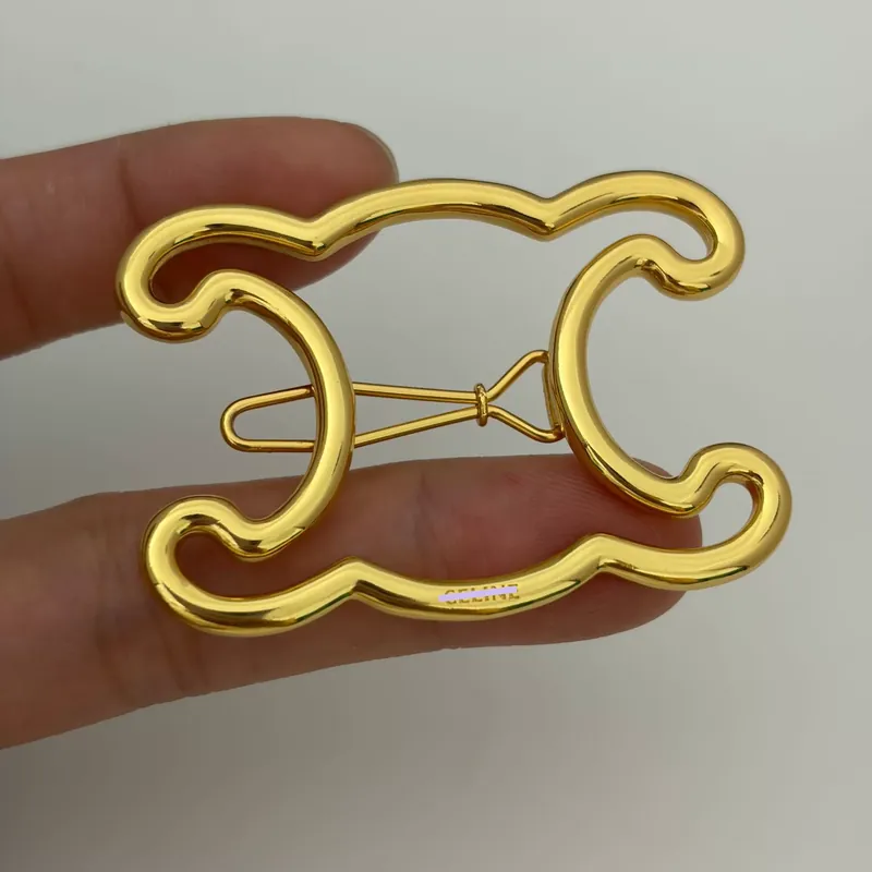 Pince à cheveux évidée Arc de Triomphe en métal, minimaliste