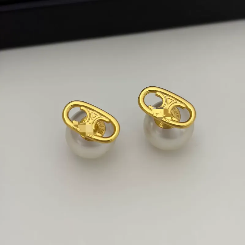 Titanium Steel Arc de Triomphe Hollow Stud Earrings Pearl Accent