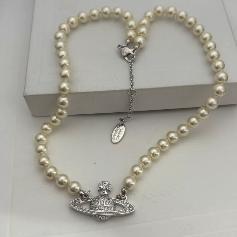 Saturn Pearl Pendant Necklace
