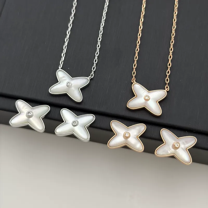 White Shell X Stud Earrings