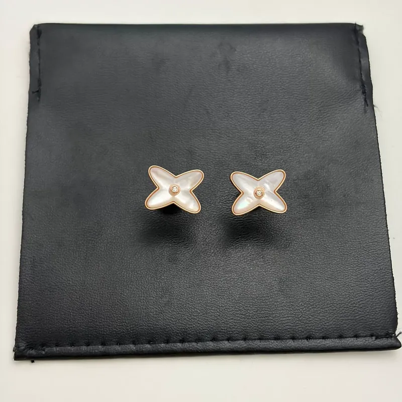White Shell X Stud Earrings