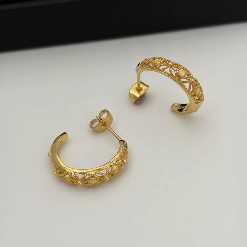 Alloy Hollow Carved Stud Earrings